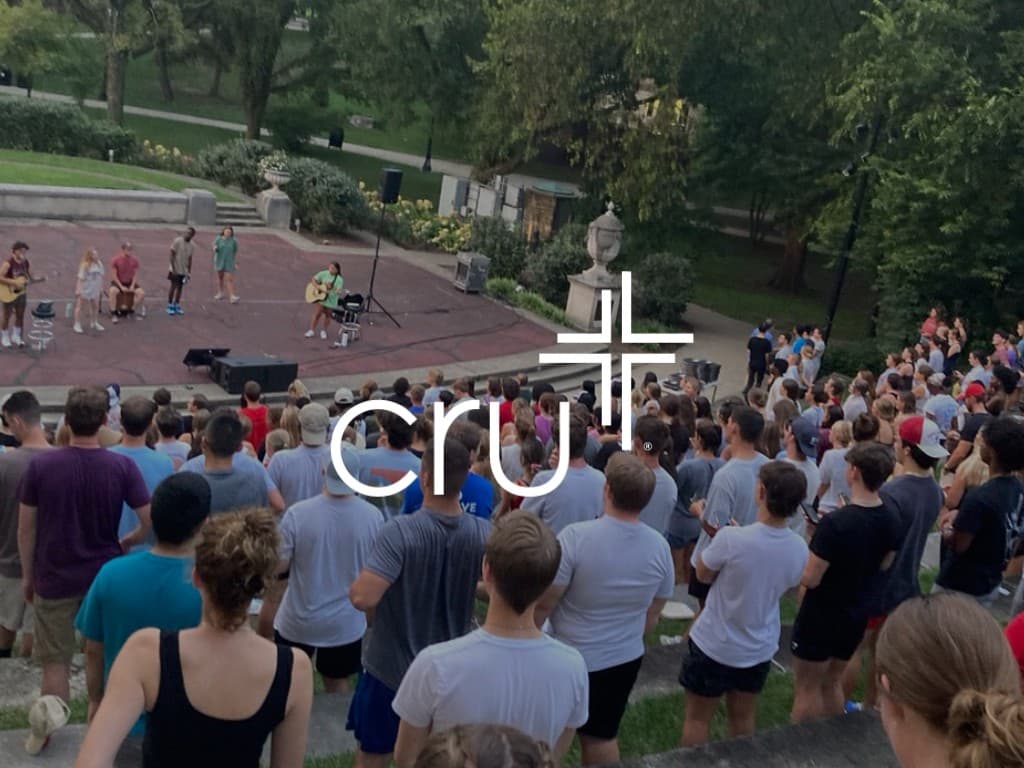 Cru at Ohio State gathering outdoors for worship on campus.